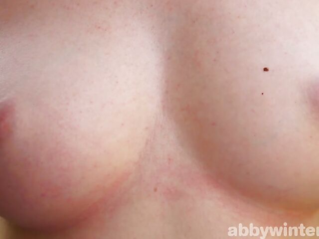 Outdoor solo posing in nature with bushy nudist girl Erina