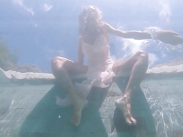 Underwater pussy in an erotic Met Art video with Mango A