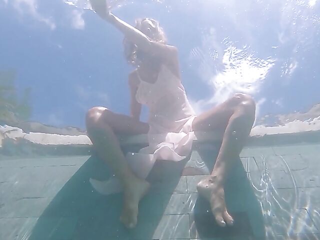 Underwater pussy in an erotic Met Art video with Mango A