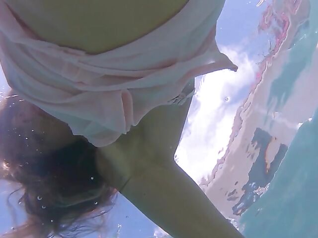 Underwater pussy in an erotic Met Art video with Mango A