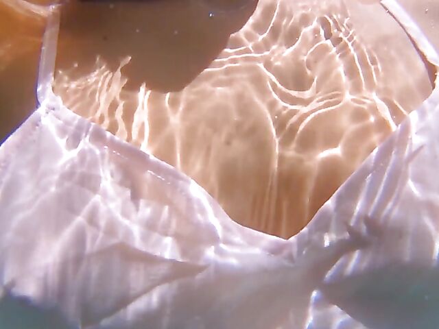 Underwater pussy in an erotic Met Art video with Mango A