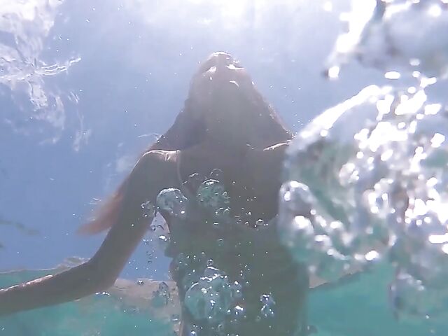 Underwater pussy in an erotic Met Art video with Mango A