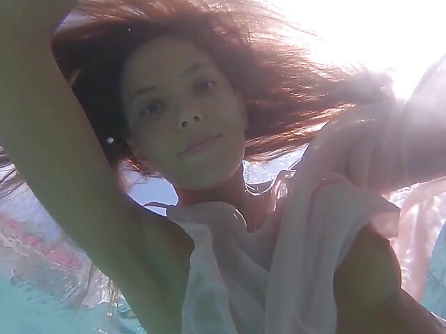 Underwater pussy in an erotic Met Art video with Mango A