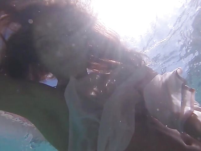 Underwater pussy in an erotic Met Art video with Mango A