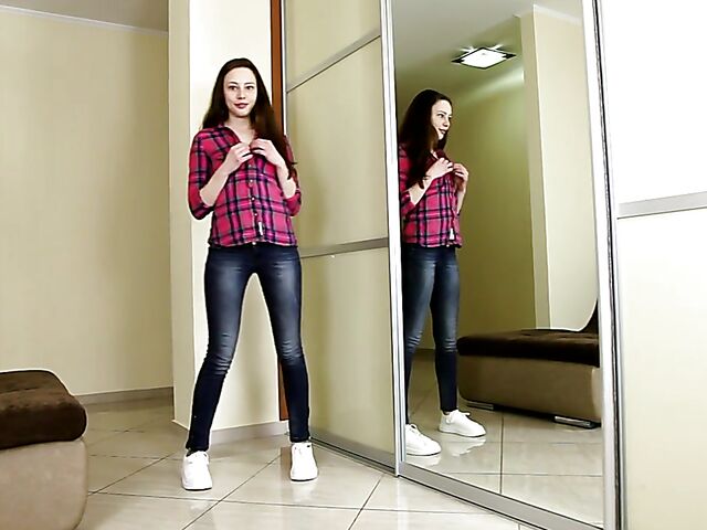 Young solo girl Annet takes off her jeans and panties to rub her twat