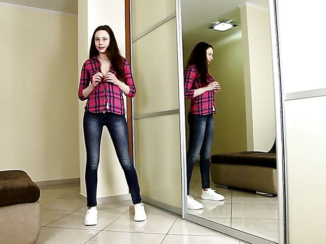 Young solo girl Annet takes off her jeans and panties to rub her twat