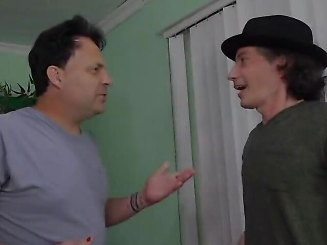 Red-haired gangbang girl April Snow fucks them all