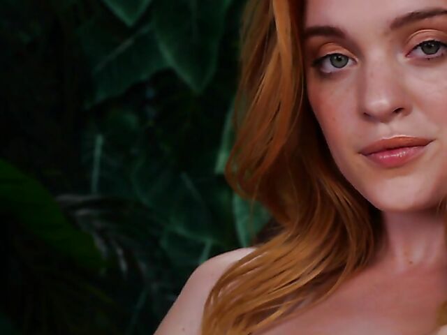 Sexy redhead Celeste Rasmussen takes off her bodysuit and shows her natural bush
