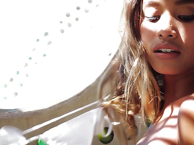 Beautiful solo on the beachfront with sexy Indonesian girl Putri Cinta