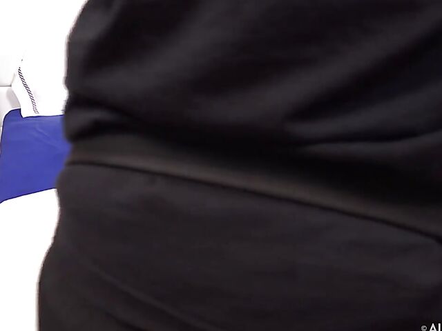 Rachel Rivers' shaved pussy spread with a speculum during her solo shoot