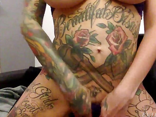 Tattoo-covered big tits pornstar Lily Lane goes solo for her fans