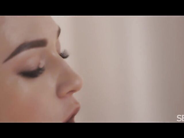 Two hot lesbians Emma Button and Jenny Wild eat and finger each other in bed