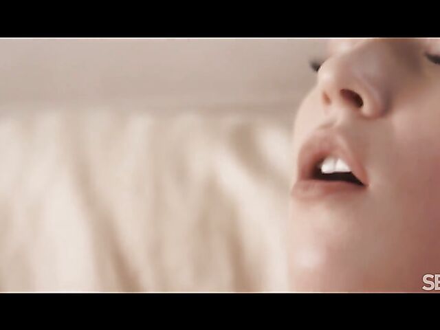 Two hot lesbians Emma Button and Jenny Wild eat and finger each other in bed