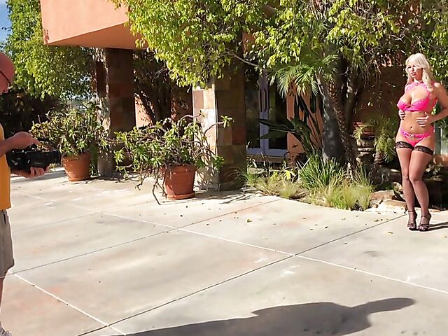 Busty MILF pornstar London River behind the scenes