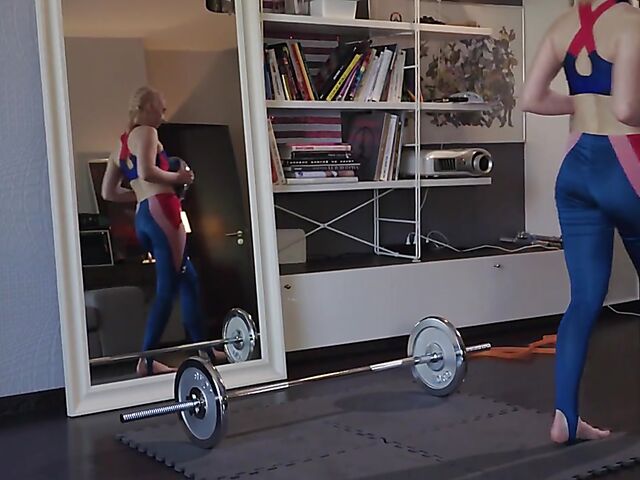 Mia gets her strapless dildo ready to fuck a cute lesbian fitness girl