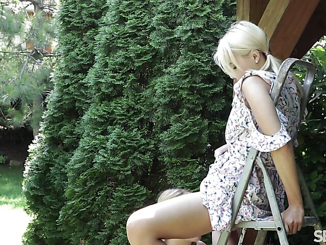 Blonde lesbians with pigtails Angelika and Lika Star make love in the garden