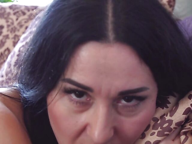 45-year-old brunette MILF Leyla Lynn gently fingers her cunt