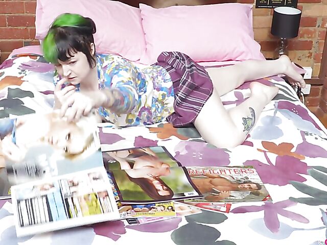 Jessa Belle - Green haired girl masturbating to sexy women from her porn magazine