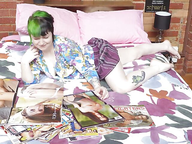 Jessa Belle - Green haired girl masturbating to sexy women from her porn magazine