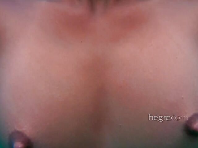 Nude asian model Jessa skinny dipping and underwater pussy in the pool