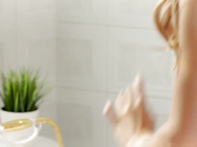 Big natural tits solo in the bathroom with Stella Cardo