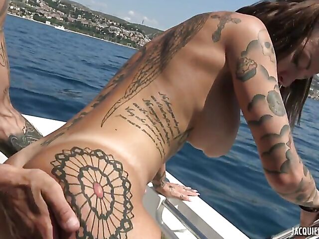 Boat sex with anal featuring a big boobed tattooed MILF from France called Eva