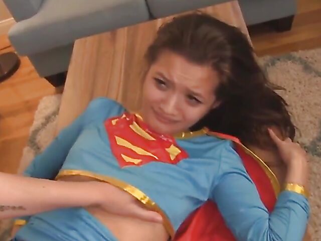 Lesbian cosplay and strap on sex with handcuffed supergirl Alex De La Flor and playful Sinn Sage