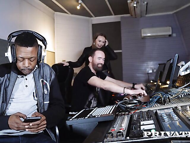 Interracial sex on the couch in the studio with Roxee Couture