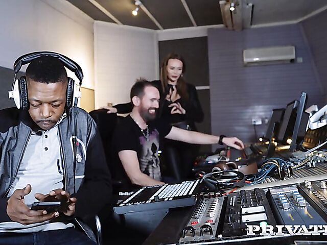 Interracial sex on the couch in the studio with Roxee Couture