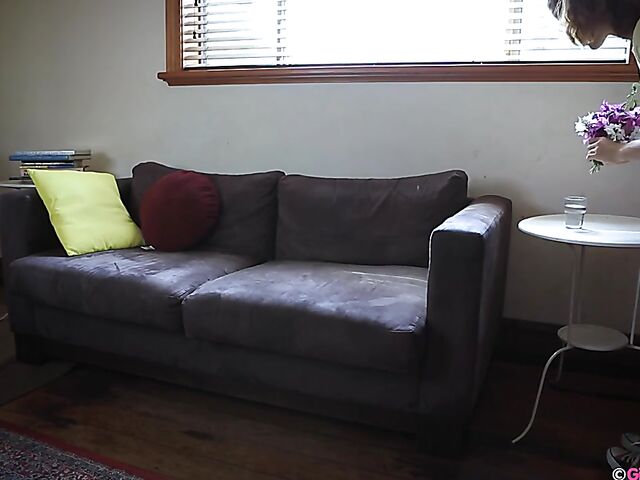 Naughty girl in a mini skirt Pixie Faye picking flowers and fingering herself