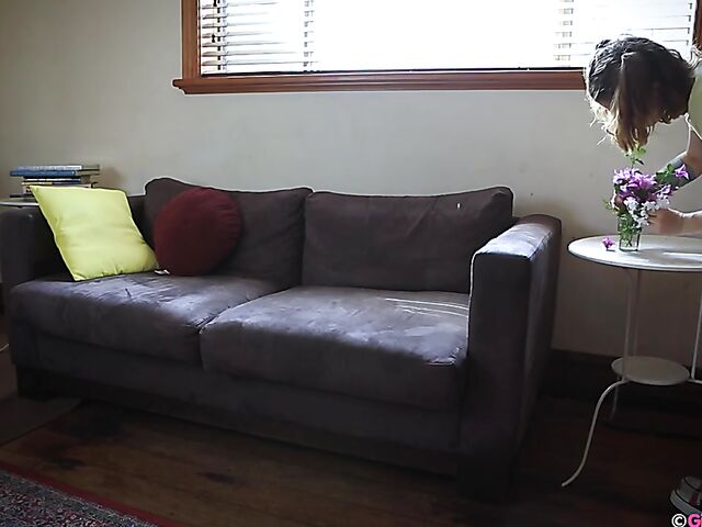 Naughty girl in a mini skirt Pixie Faye picking flowers and fingering herself