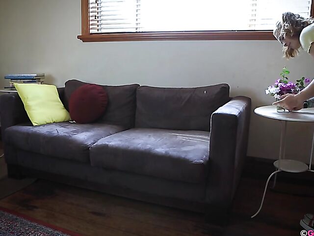 Naughty girl in a mini skirt Pixie Faye picking flowers and fingering herself