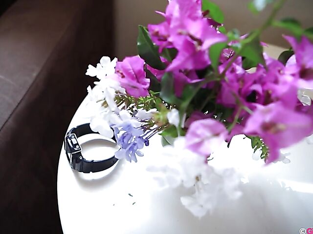 Naughty girl in a mini skirt Pixie Faye picking flowers and fingering herself