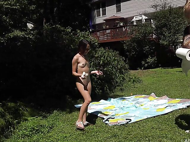 Petite Freya Von Doom's pussy spread in the sun behind the scenes