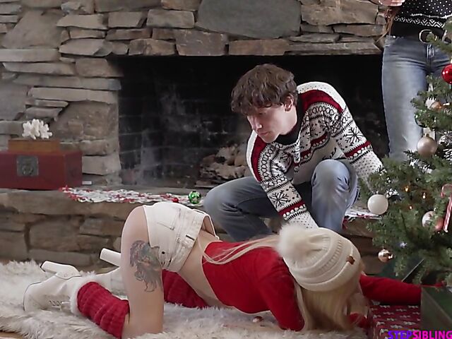 Two petite teens Kenzie Reeves and Lulu Chu have a Christmas threesome