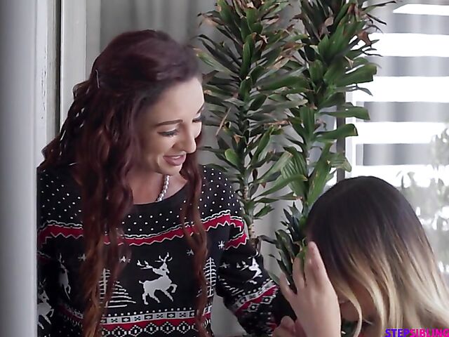 Two petite teens Kenzie Reeves and Lulu Chu have a Christmas threesome