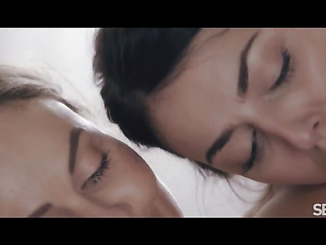 Sensual lesbian lovers Alysia Bounty and Tina Kay go to bed