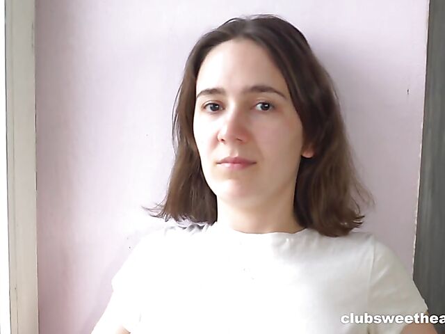 Alice Benz showing her natural tits by the window and fingering herself