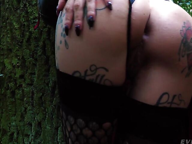 Tattooed witch Megan Inky solo anal dildo gape in the forest