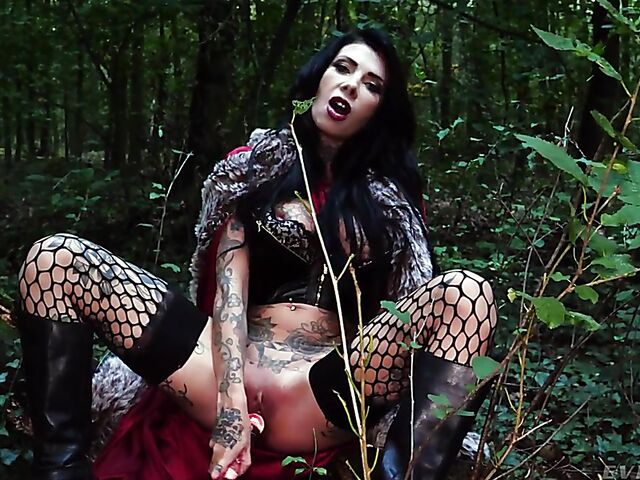 Tattooed witch Megan Inky solo anal dildo gape in the forest