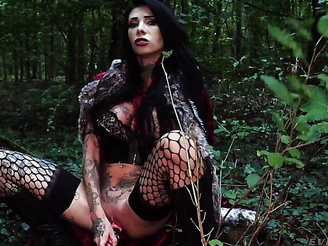 Tattooed witch Megan Inky solo anal dildo gape in the forest