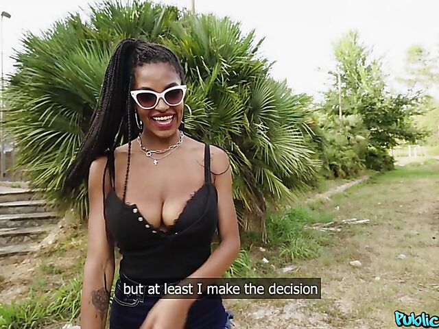 Ebony huge tits girl Tina Fire fucks a white cock outdoors for cash