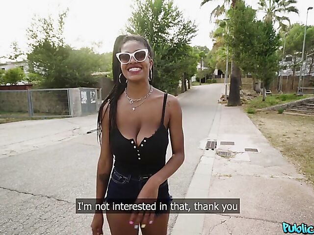 Ebony huge tits girl Tina Fire fucks a white cock outdoors for cash