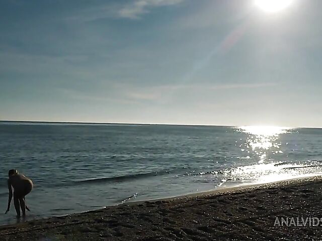 Interracial beach anal threesome with two sexy nudists Paola Hard and Lily Doll