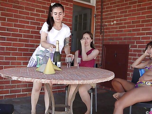 Three lesbians Eva Maye, Kitty Du Jour and Rubi Valentine drink champagne and fist each other's pussies in the backyard