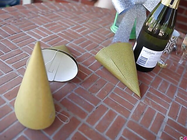 Three lesbians Eva Maye, Kitty Du Jour and Rubi Valentine drink champagne and fist each other's pussies in the backyard