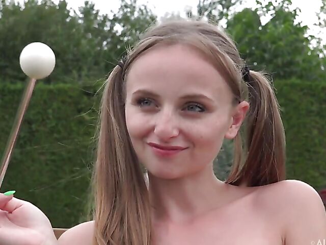 Lady Bug - Pigtails and pussy insertion in the garden