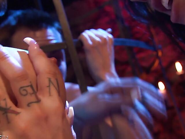 Kinky lesbian brunettes have sex in the dungeon as their male slave jerks off