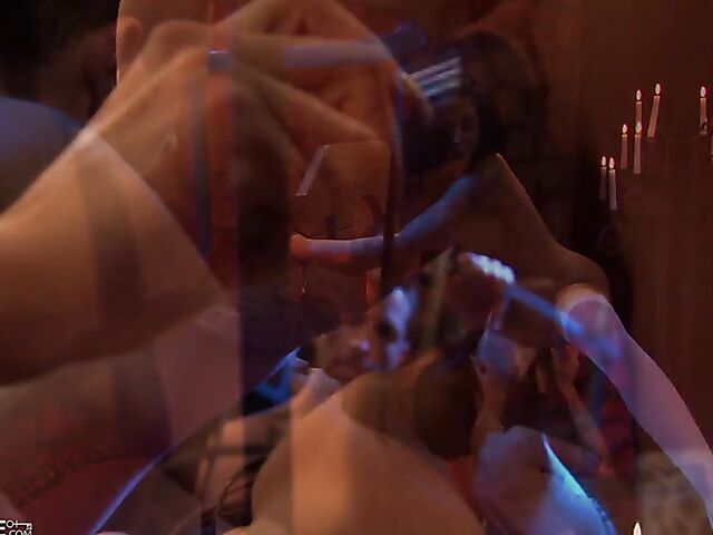 Kinky lesbian brunettes have sex in the dungeon as their male slave jerks off