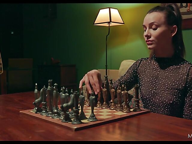Bored Adel Morel playing chess alone and fingering herself in the evening